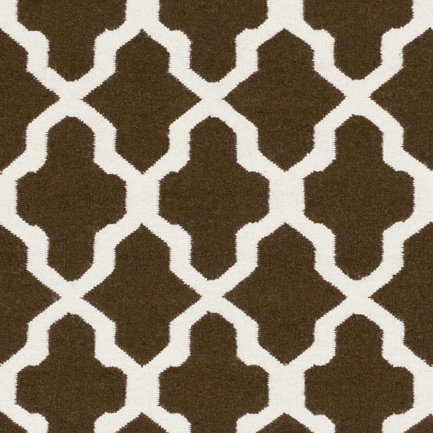 Close-up of the Okoboji Area Rug. Hand-woven wool rug features a dark brown and ivory geometric trellis pattern. Swatch