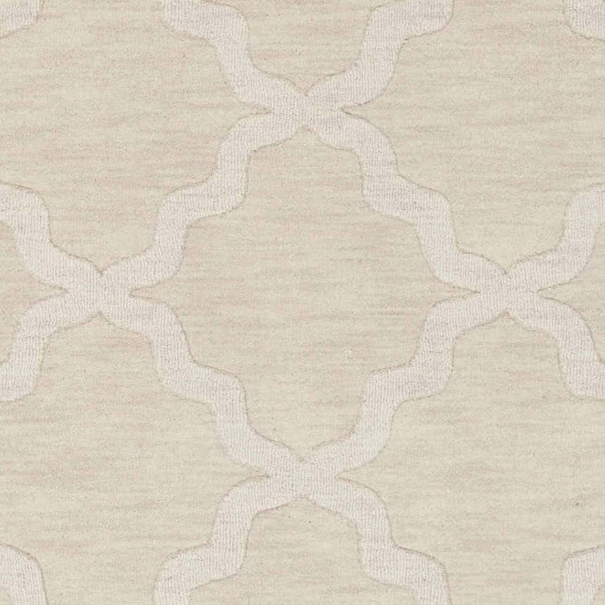 Close-up of the beige Orick Hand Loomed Wool Area Rug featuring a raised quatrefoil pattern. Swatch
