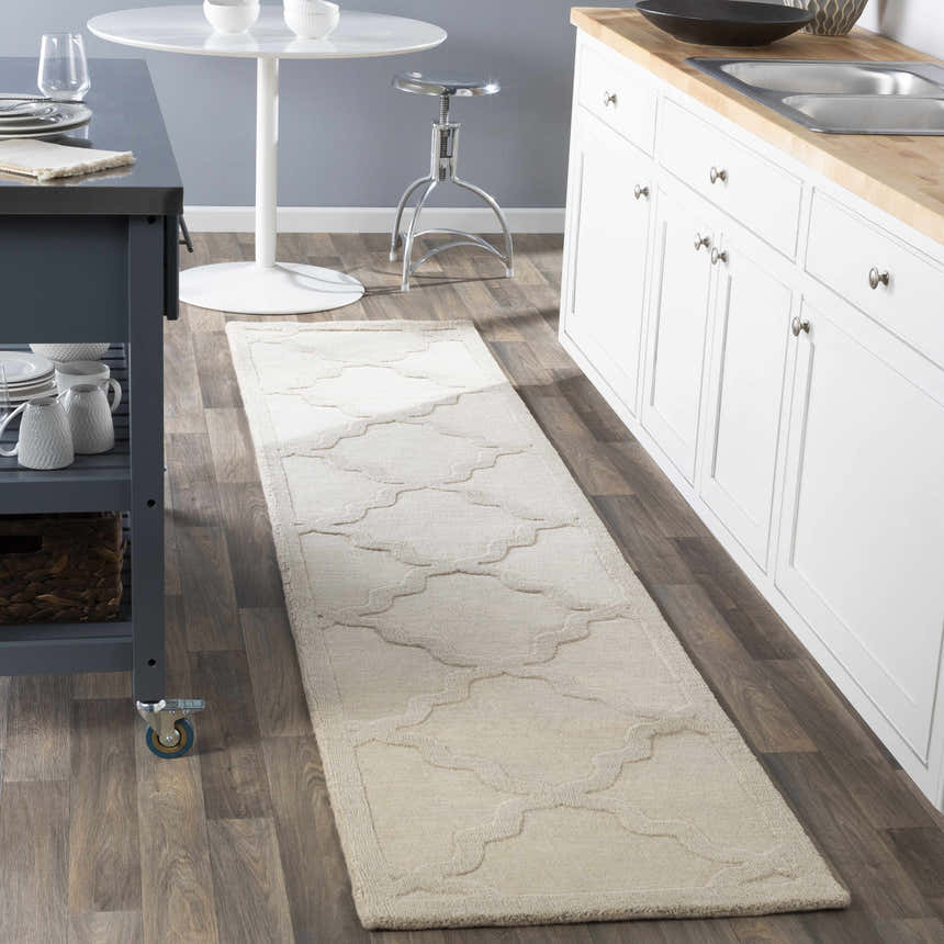 Beige Orick Hand Loomed Wool Area Rug runner in a modern kitchen with white cabinets and butcher block countertops. Roomscene-Runner
