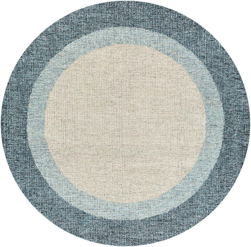 Close-up of round Padada Green Bordered Cream Wool Rug with concentric circles of cream, light blue, and navy blue. Design-Round-8