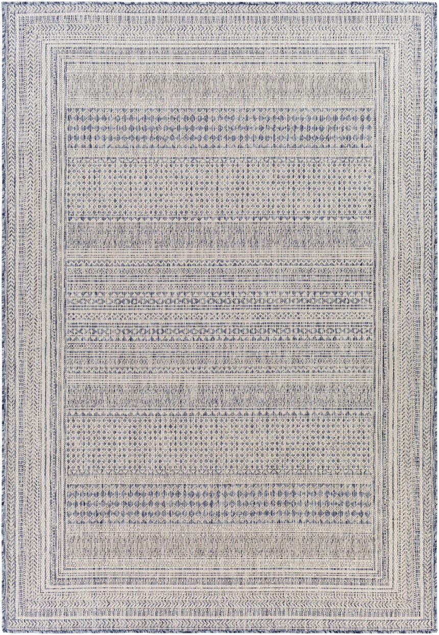 Close-up of the Panaytayon Area Rug. Cream and navy rug with a contemporary, geometric pattern and woven texture. Design-Rectangle-537