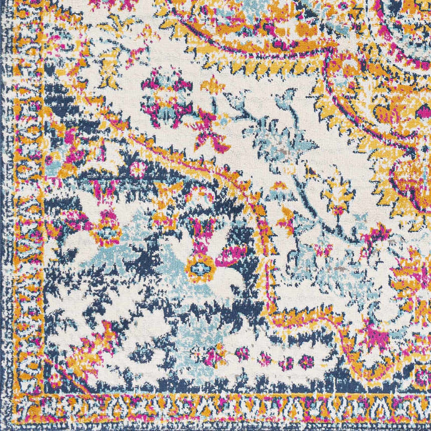 Close-up of Pimperne Traditional Medallion Area Rug. Features burnt orange, fuchsia, navy, and light blue floral pattern. Swatch