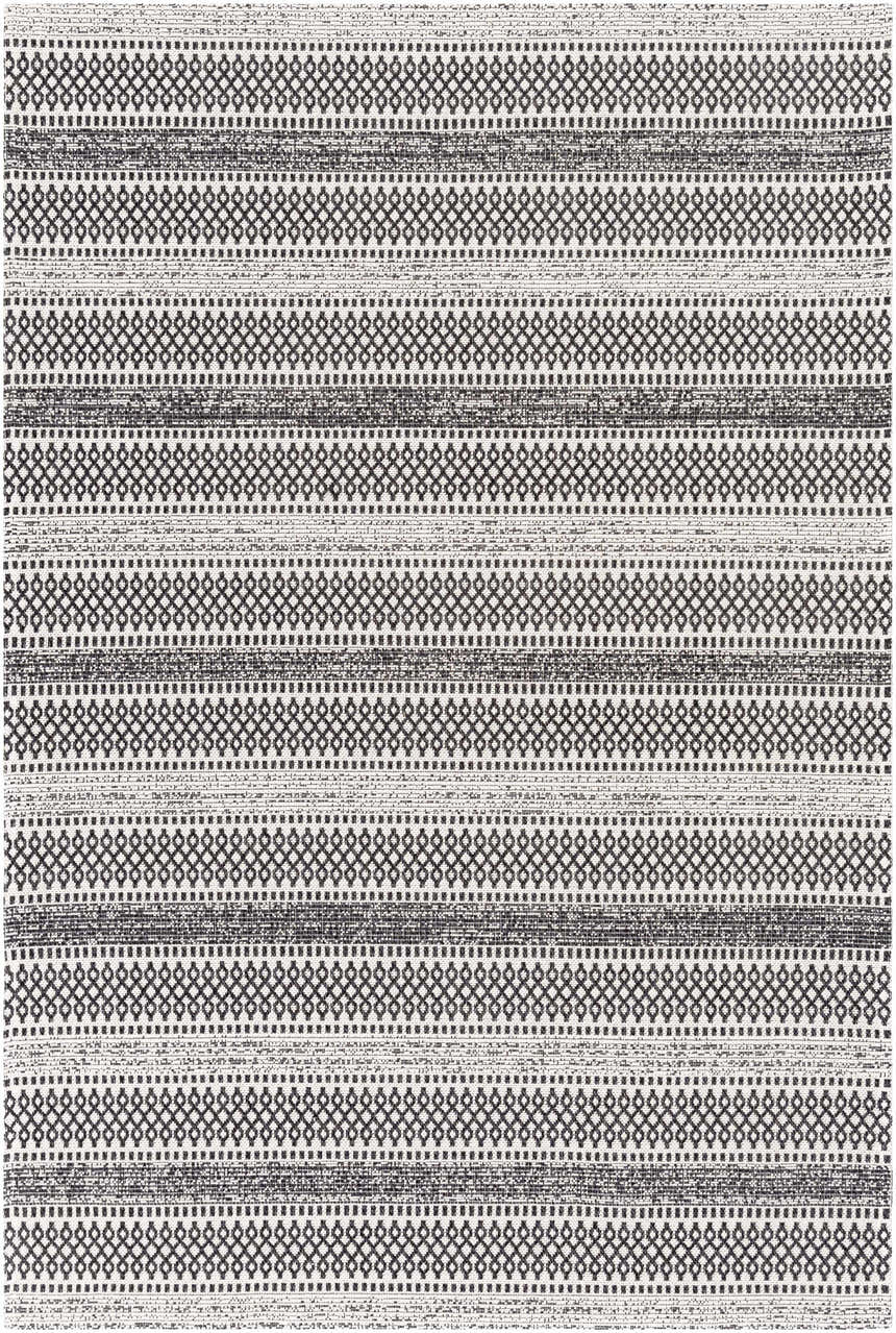 Close-up of the Planada Washable Area Rug. Black and cream cotton rug with a bohemian-inspired geometric pattern. Design-Rectangle-5373