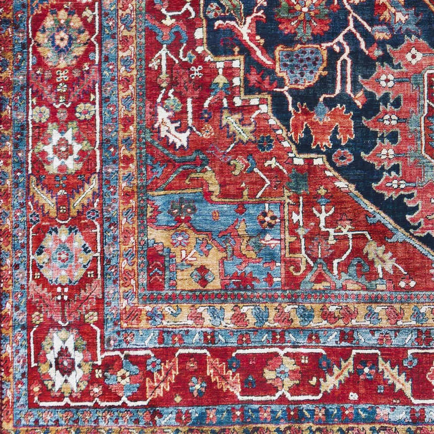 Close-up of the Pauline Red Medallion Performance Rug, showcasing its burgundy, blue, and cream traditional pattern. Swatch