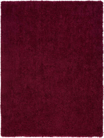 Close-up of the dark red Porter Area Rug, a hand woven shag rug with a soft, textured pile. Design-Rectangle-810