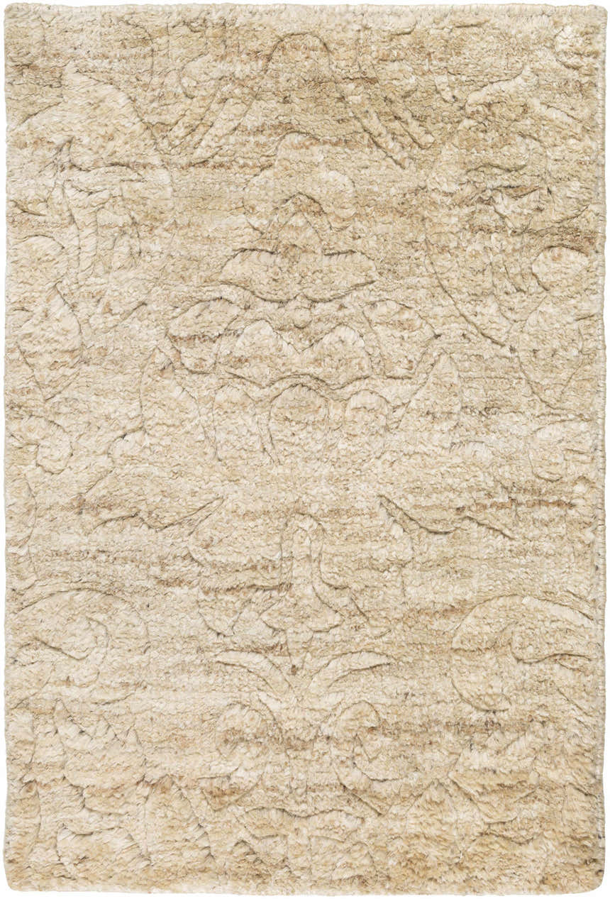 Close-up of the beige Pomaria Area Rug. Hand-knotted jute rug with a subtle traditional pattern and soft, textured surface. Design-Rectangle-23