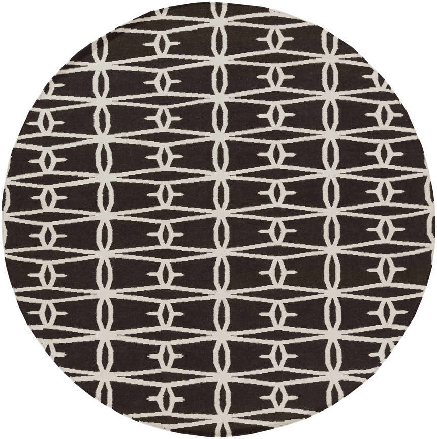 Close-up of the Potsdam Area Rug. Dark brown wool rug with a geometric, white pattern. Hand woven rug texture. Design-Round-8