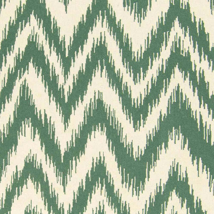 Close-up of the Parsonsfield Area Rug showing a cream and medium green ikat pattern. 100% wool texture. Swatch