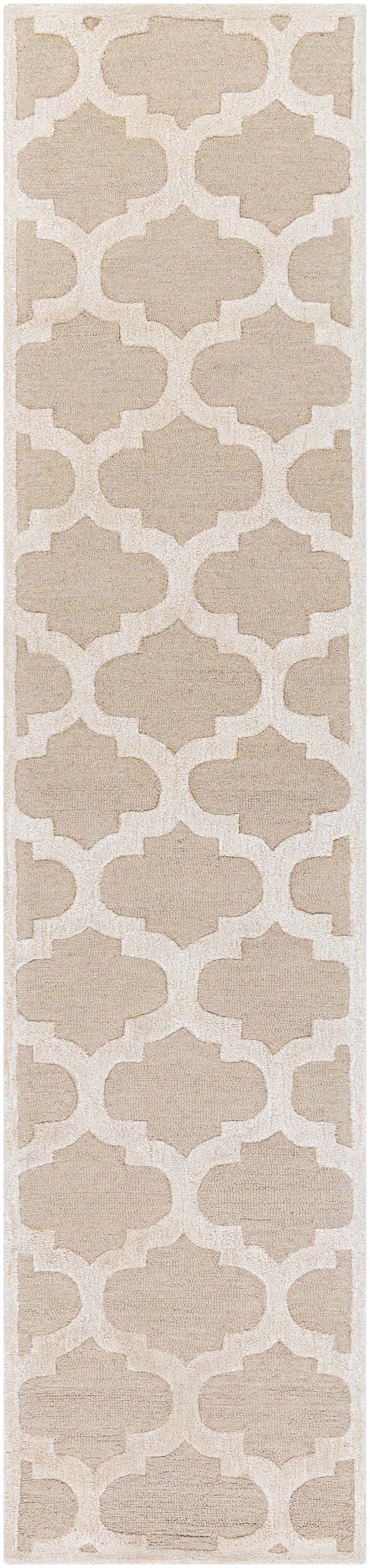 Close-up of the Quicksand Area Rug runner featuring a neutral quatrefoil pattern and a hand-tufted wool texture. Design-Runner-310