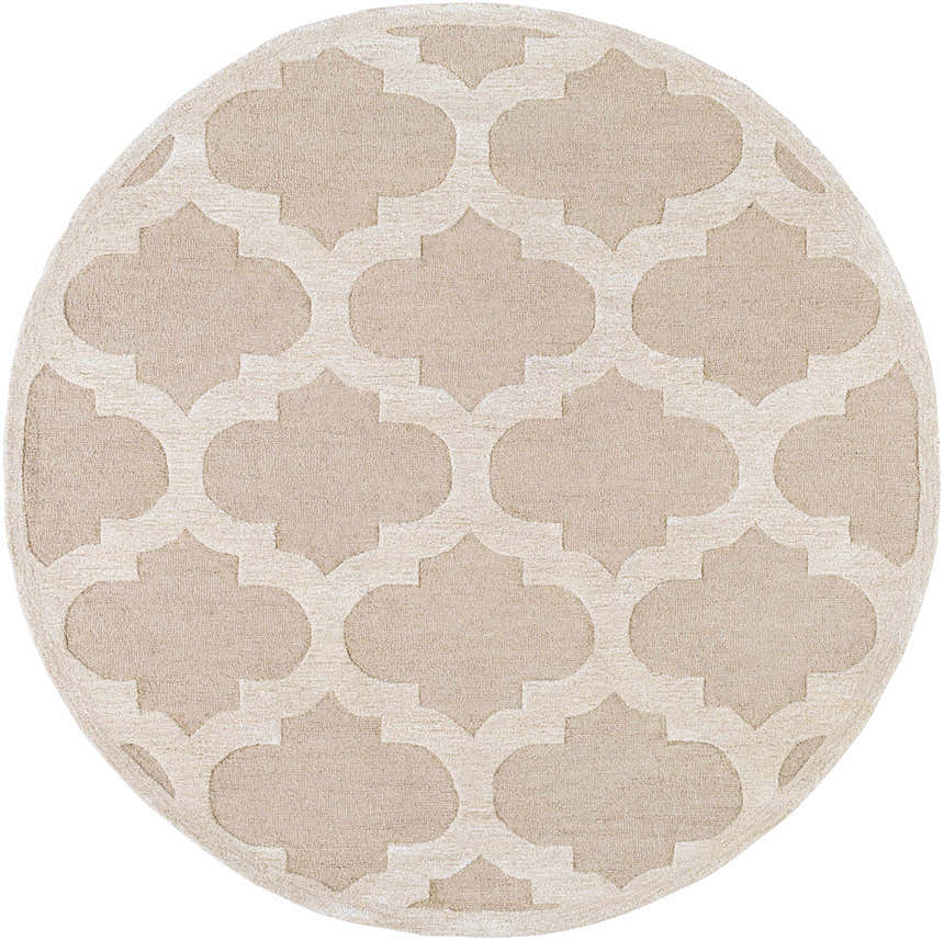 Close-up of a round Quicksand Area Rug. Hand-tufted wool rug with a beige quatrefoil pattern. Contemporary style. Design-Round-6