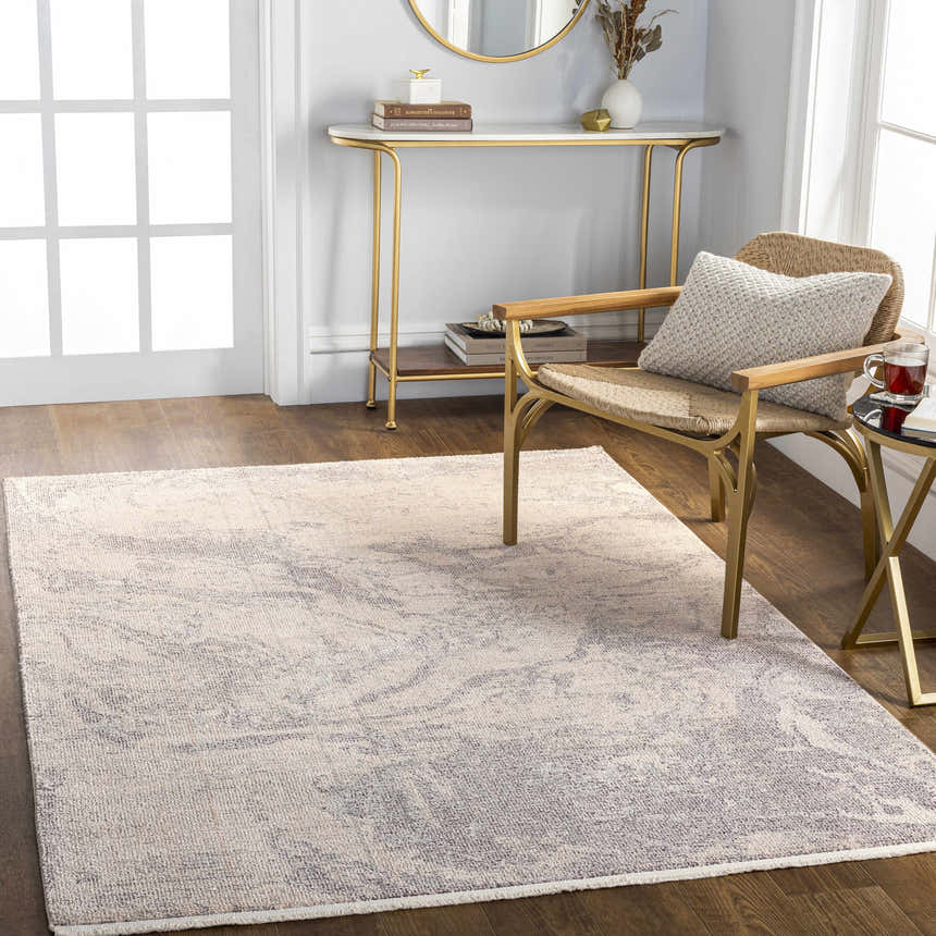 Entryway with Rahm Ivory Marble Area Rug, gold console table, and woven chair. Light and airy. Roomscene-Rectangle