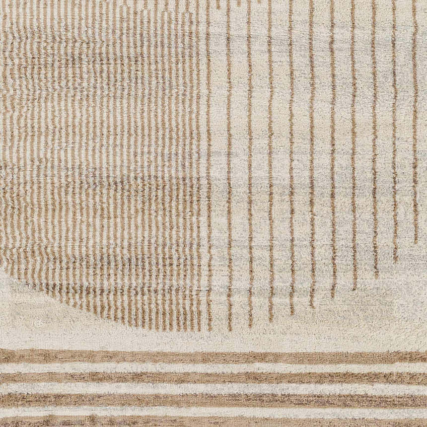 Close-up of the Zeke Geometric Nutmeg Rug, featuring a linear pattern in nutmeg and lambswool hues. Contemporary design. Swatch