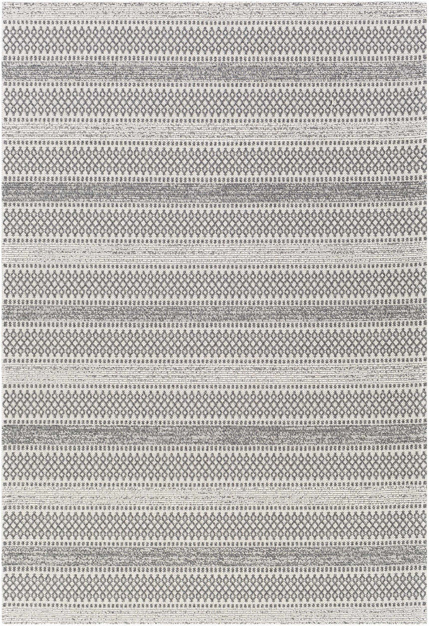 Close-up of Ringtown Washable Area Rug. Charcoal and ivory cotton rug with a bohemian diamond and stripe pattern. Design-Rectangle-5373