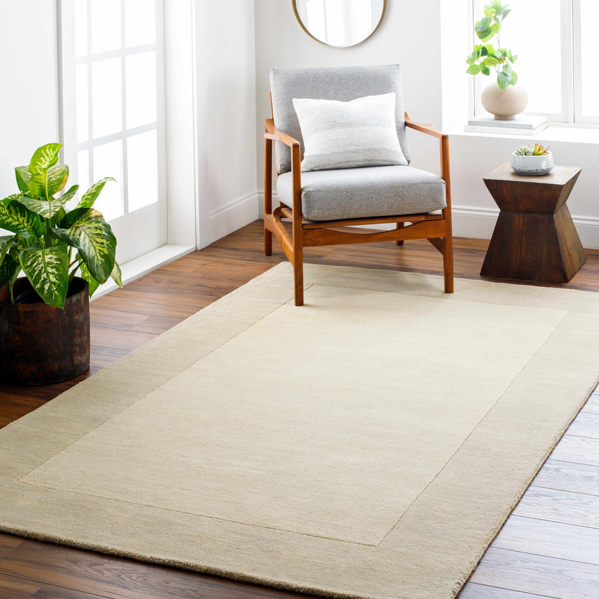 Bordered Solid Beige Cream Wool Rug