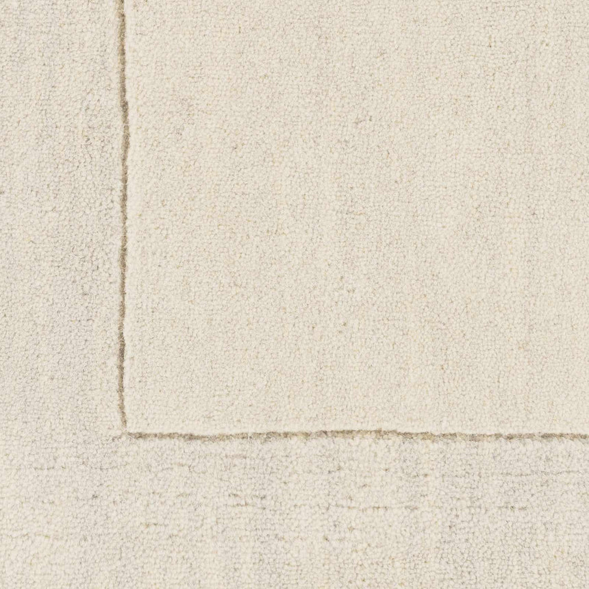 Bordered Solid Beige Cream Wool Rug