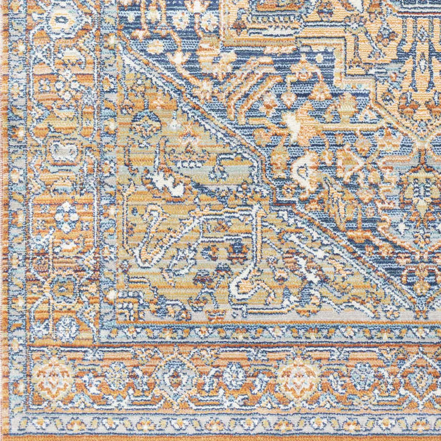 Close up of the Ripponlea Area Rug, showcasing its traditional design, navy, saffron, and ivory colors. Swatch