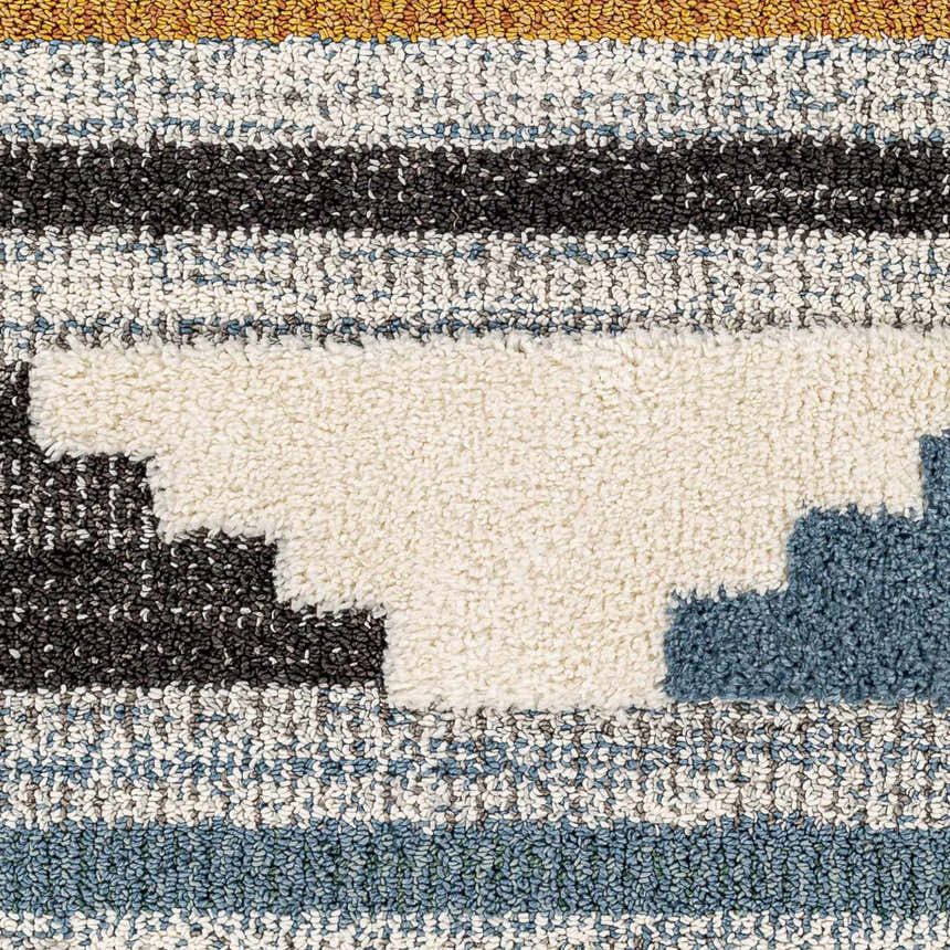 Close-up of the Rosslare Area Rug showing the shag texture and striped pattern in black, blue, off white, and gray. Swatch