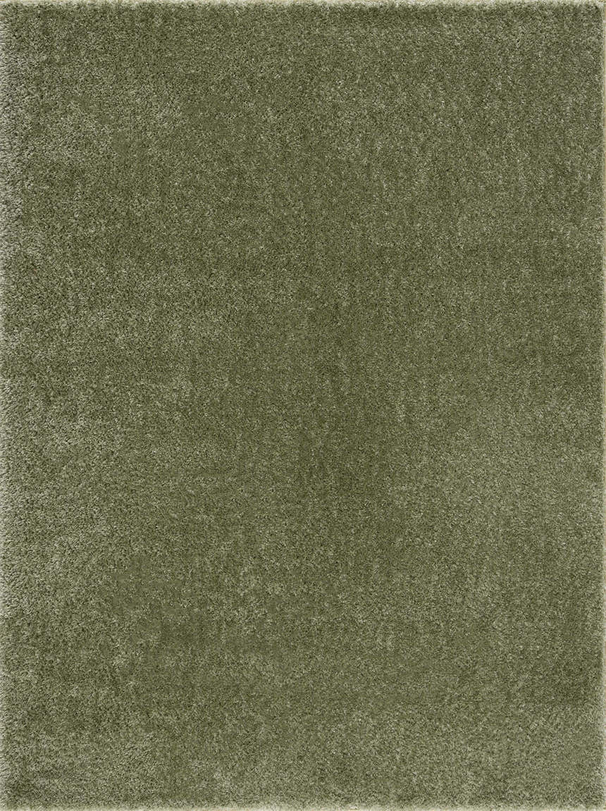Close-up of the Heavenly Solid Green Plush Rug, showing its soft, textured shag pile. Design-Rectangle