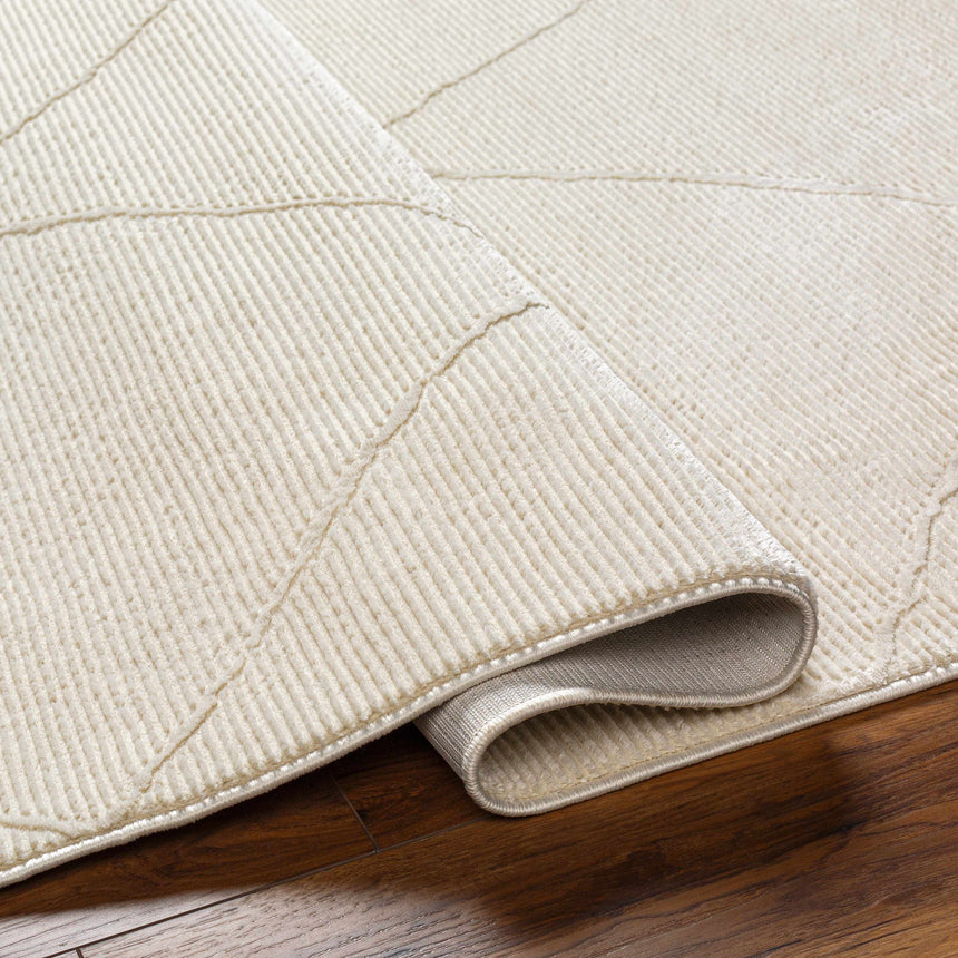 Aldis Cream Plush Textured Washable Rug