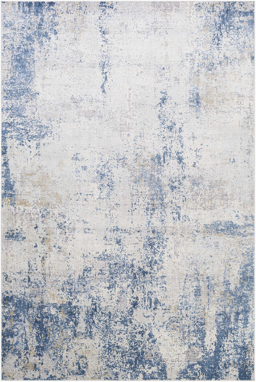 Close-up of the Sapcote Textured Luxe Area Rug, featuring a distressed pattern in light blue, beige, and white. Design-Rectangle-6796
