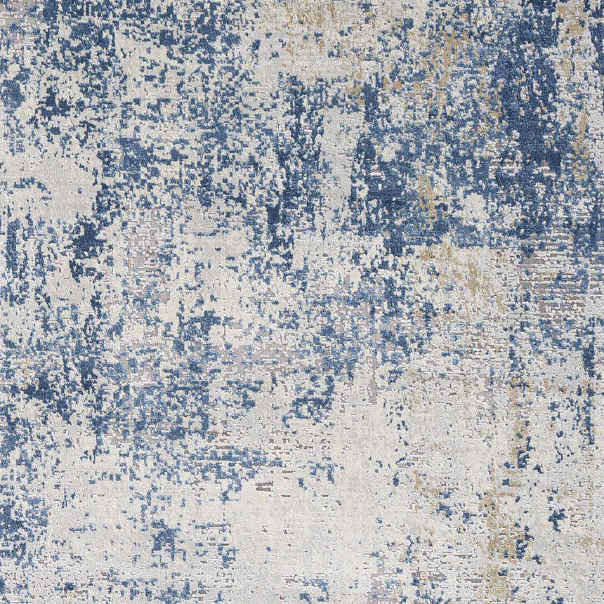 Close-up of the Sapcote Textured Luxe Area Rug, featuring a distressed pattern in charcoal, dark blue, and light beige. Swatch