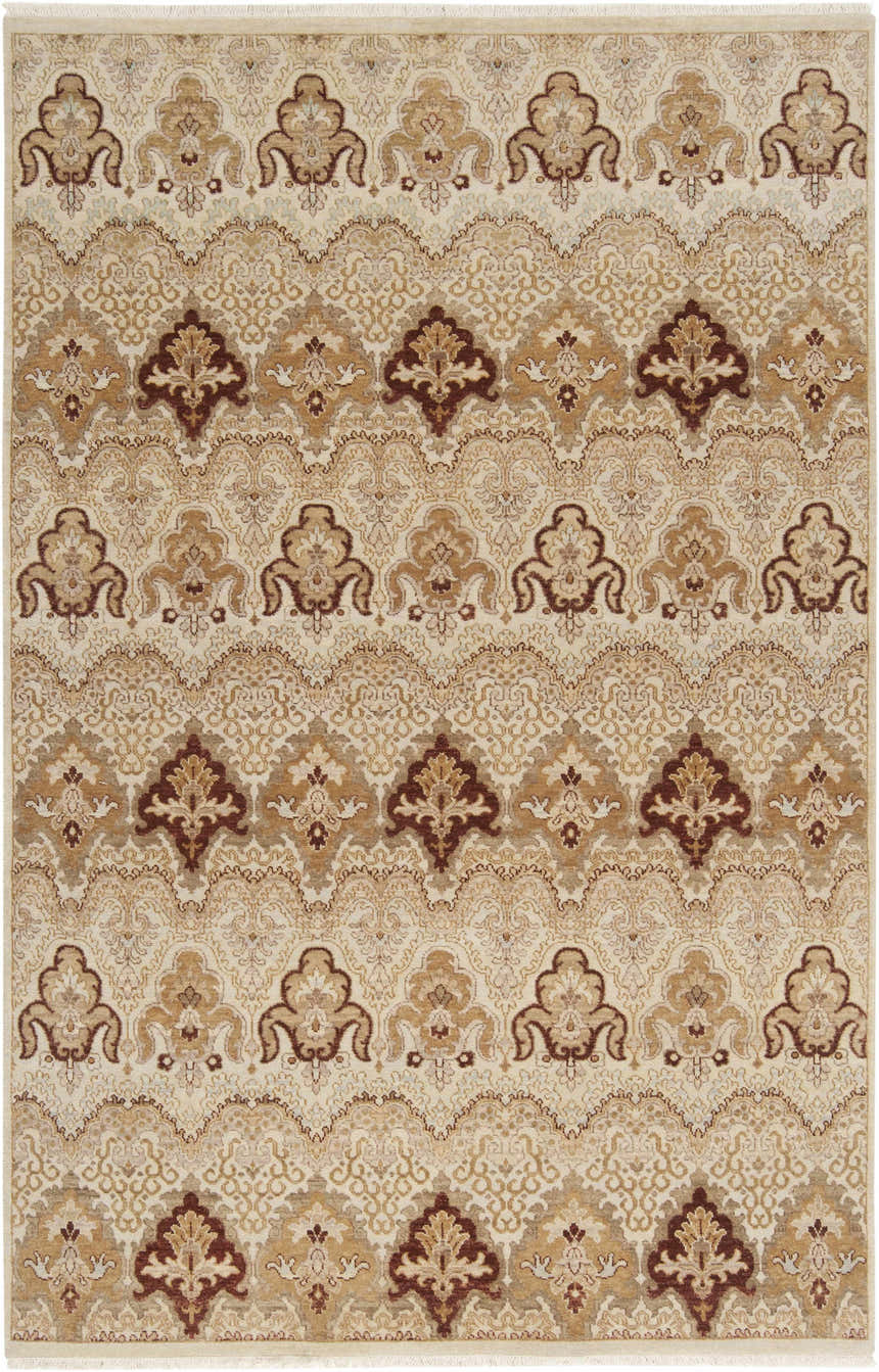 Close-up of the Saratoga Area Carpet. Hand-knotted wool rug in brick red, camel, and light brown with a traditional pattern. Design-Rectangle-5686