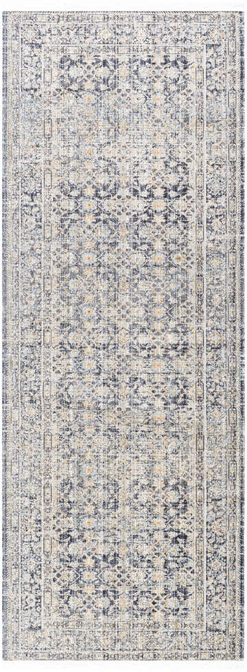 Close-up of the Margaret Navy Washable Rug, a traditional rug with ash, light gray, and navy floral pattern. Becki Owens x Livabliss. Design-Runner-2773