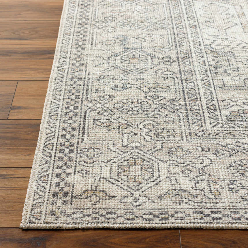Close-up of the Margot Medallion Light Gray rug showing its traditional design, light gray, brown, and charcoal colors. Front