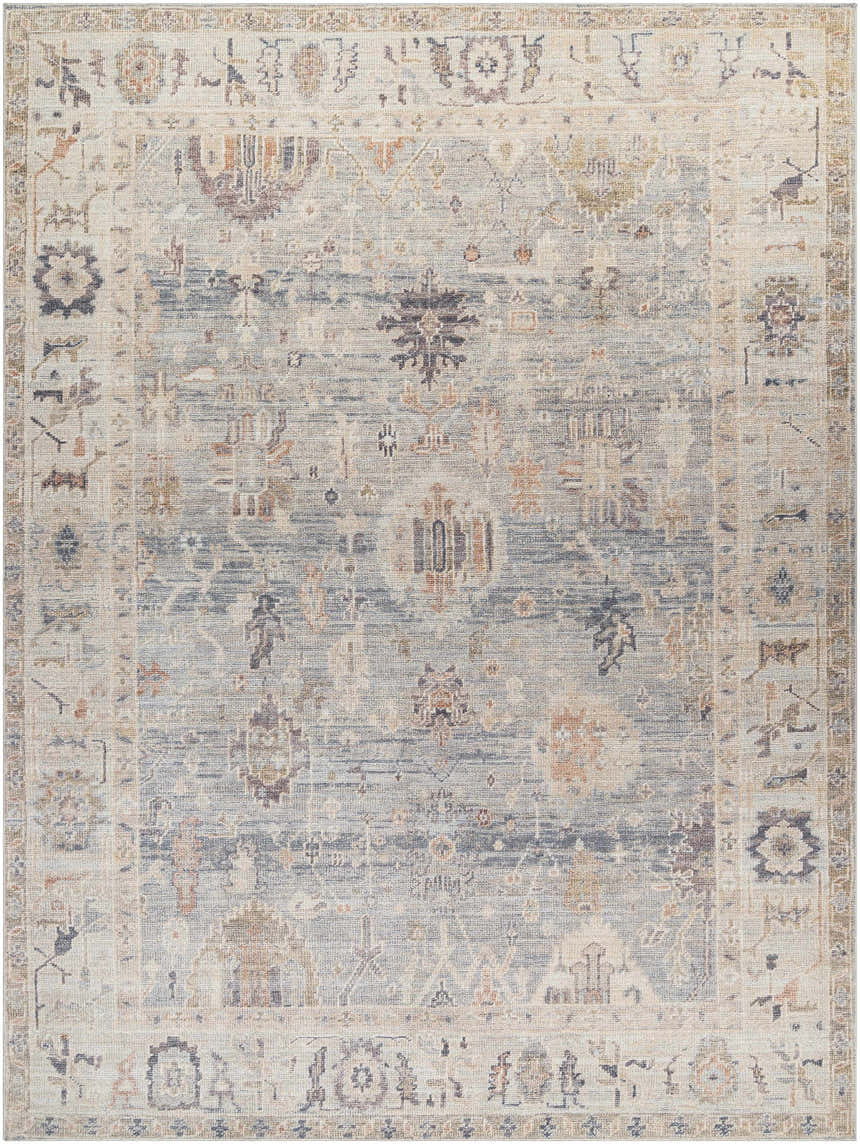 Close-up of the Marlene Damask Cream & Blue Area Rug, a traditional rug with a farmhouse style damask pattern. Design-Rectangle-9212