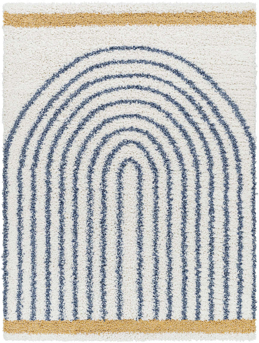 Close-up of the Jola Area Rug. Features a geometric design with arctic stone, camel, and denim colors. Shag texture. Design-Rectangle-537