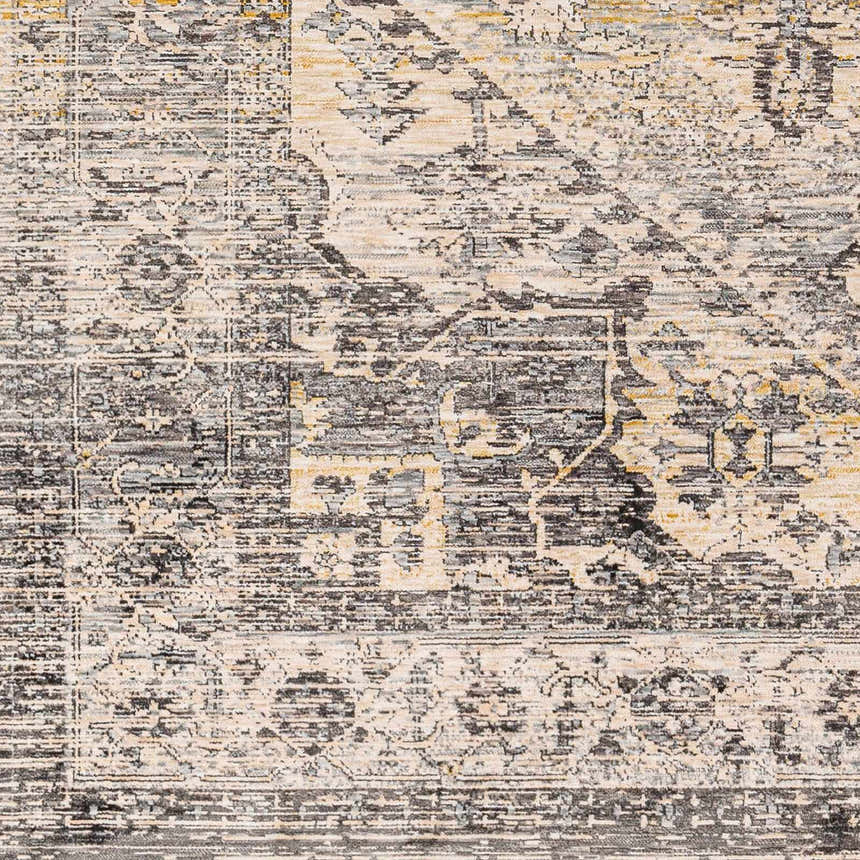 Close-up of the Ailsa Area Rug, showcasing its farmhouse-style pattern in dark gray, lambswool, and taupe hues. Swatch