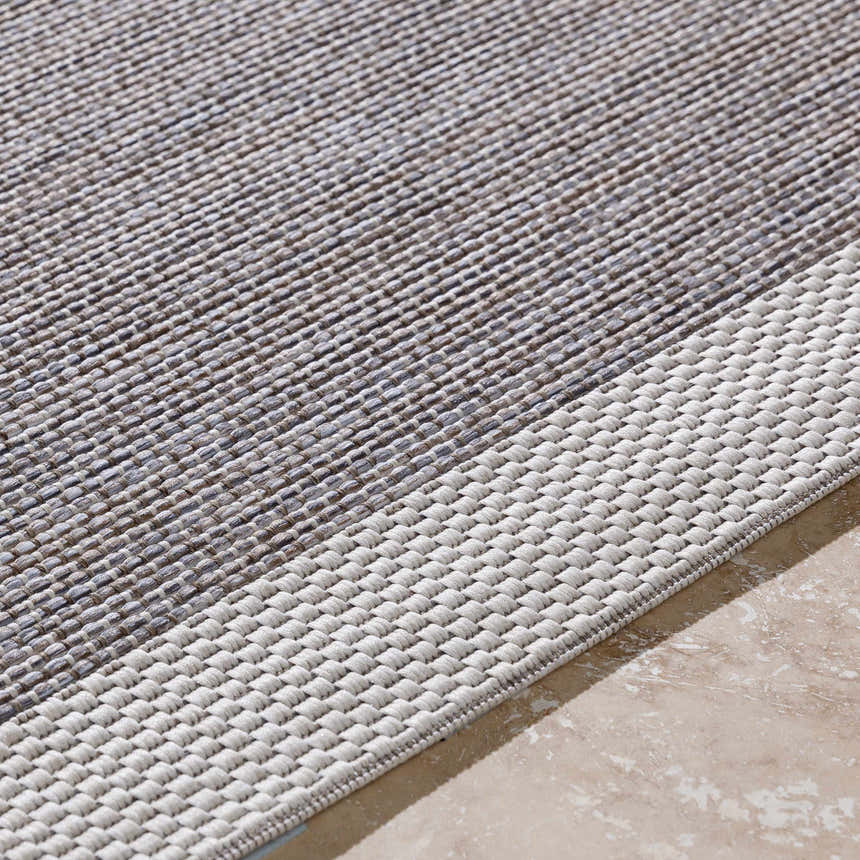 Close-up of the Escalon Area Rug, cream and taupe woven texture, contemporary solid and striped design. Texture