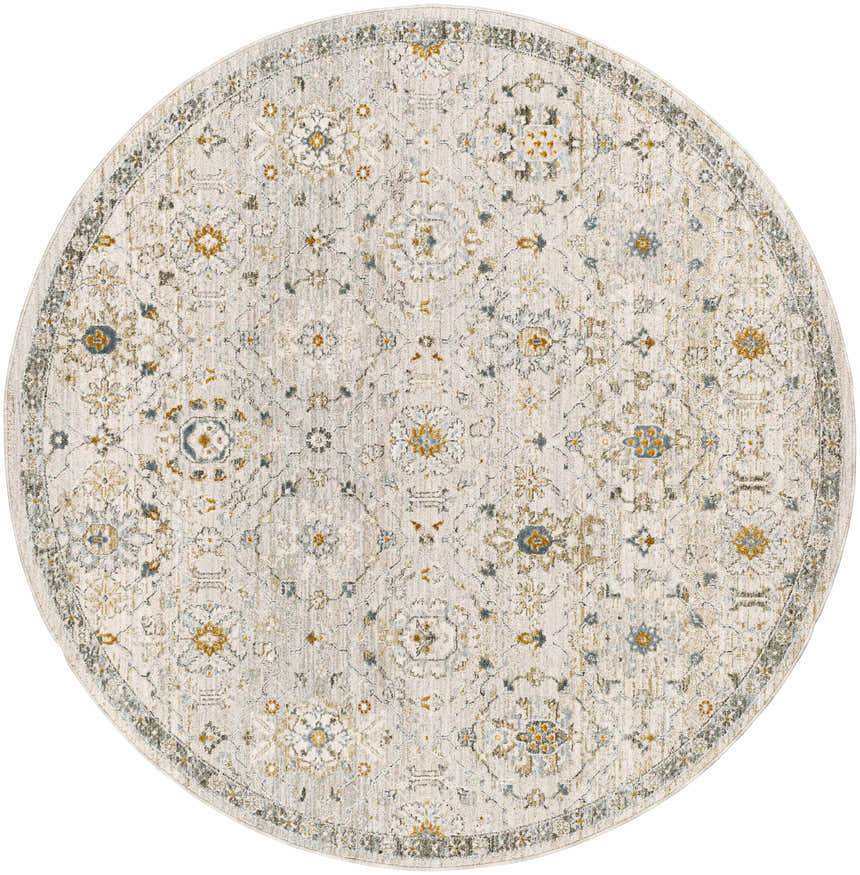 Close-up of the round Annie Cream Textured Rug. Features a traditional floral pattern in cream, gold, and blue. Design-Round-53