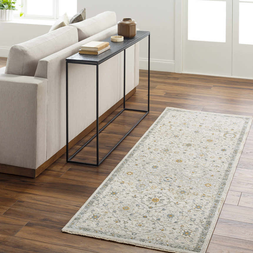 Living room scene with the Annie Cream Textured Rug, sofa, and console table. Roomscene-Runner