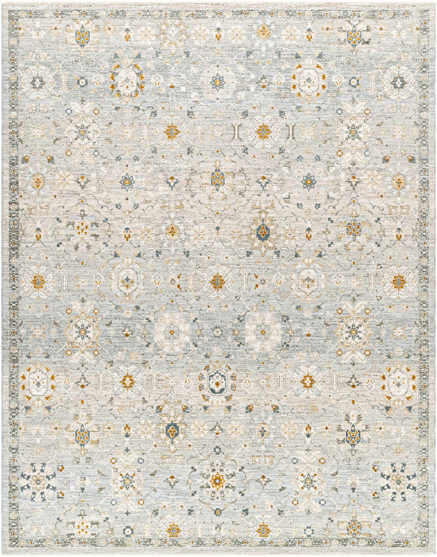 Close-up of Annie Green Textured Rug with Fringes. Farmhouse style rug with floral pattern in green, gold, and blue tones. Design-Rectangle-710103