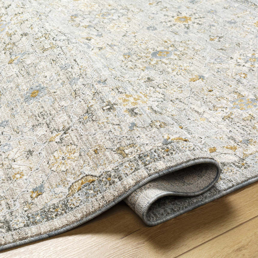 Close up of the Annie Green Textured Rug showing its cotton weave and farmhouse style. Fold