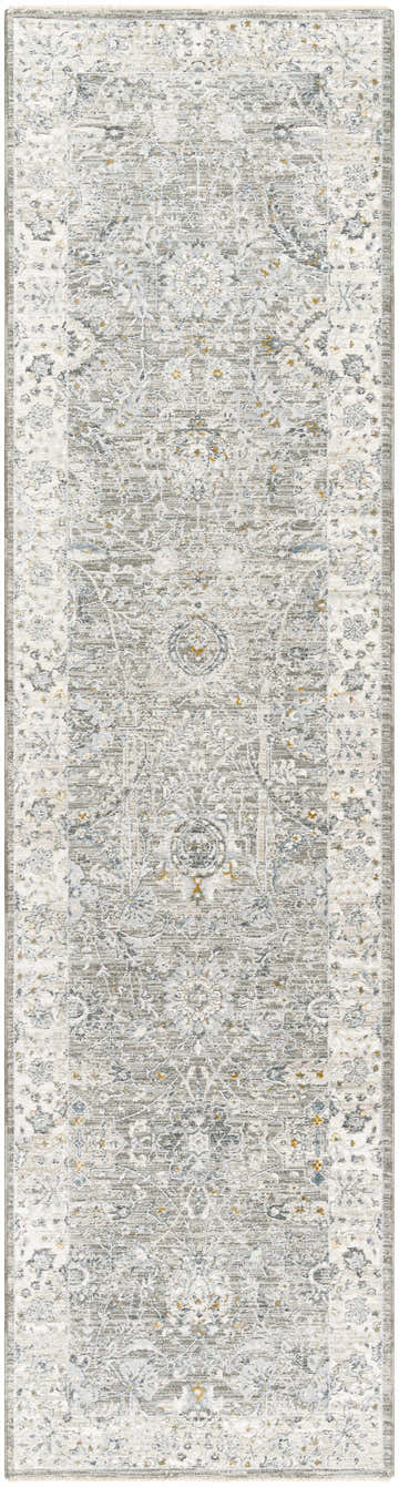 Close-up of the Gauge Gray Blue Textured Rug. Features a traditional, distressed pattern with gray, blue, and brown tones. Design-Runner-2710