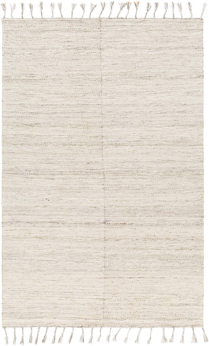 Close-up of the hand-woven Anaya Cream Area Rug. Features beige, bone, and clay tones with a subtle farmhouse texture and fringe. Design-Rectangle-576