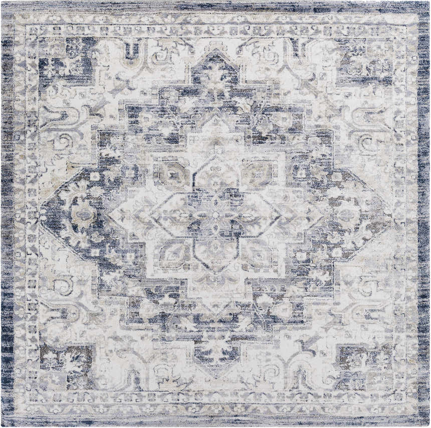 Close-up of the Shotts Thick Luxe Rug, a machine-woven rug with a traditional charcoal, cream, and blue oriental pattern. Design-Square-710