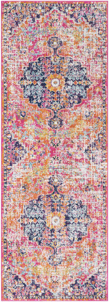 Close-up of the Shueyville Area Rug. Features a distressed vintage pattern in burgundy, burnt orange, mustard, navy, teal, and white. Design-Runner-2773