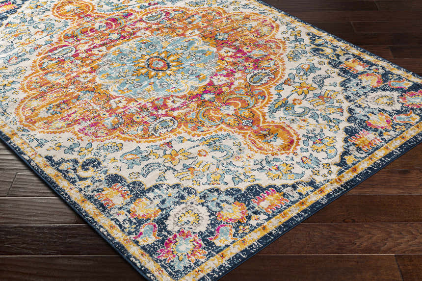 Close-up of the Silkstone Area Rug showcasing its aqua, cream, orange, and blue traditional floral pattern. Corner