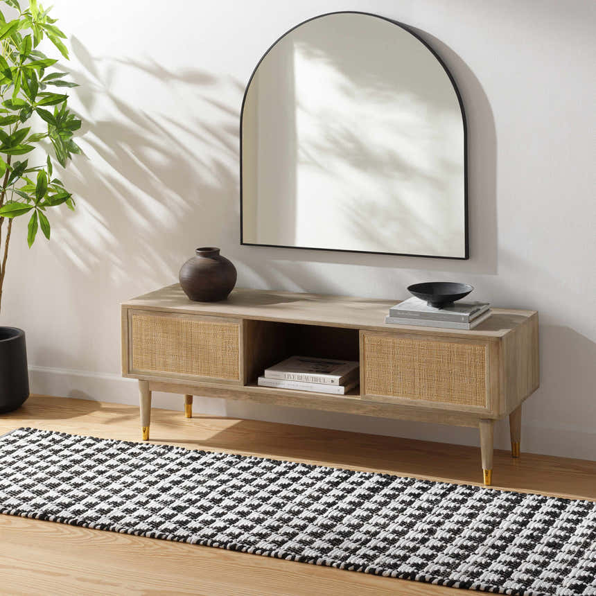 Entryway with a console table, mirror, and black and white Gzifa Jute Rug runner on wood floor. Roomscene-Runner