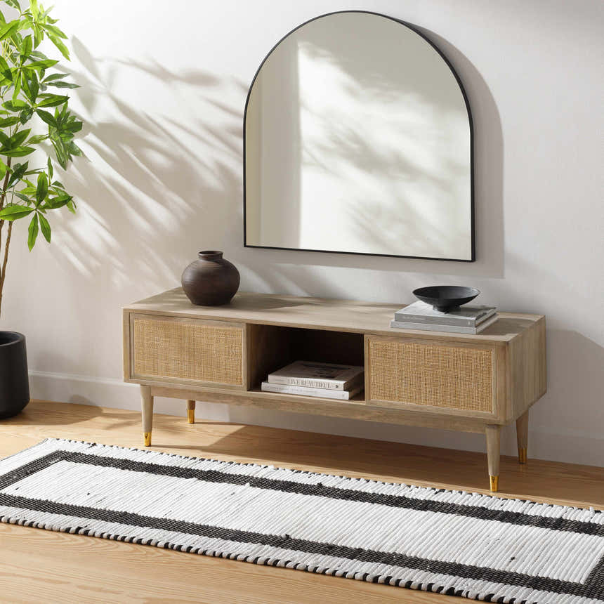 Entryway scene with a Jaden Area Rug runner in charcoal and white, styled with a console table, mirror, and plant. Roomscene-Runner