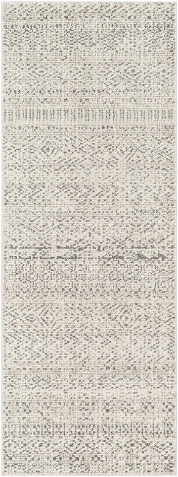 Close-up of the Truc Area Rug. Bone rug with a subtle, geometric pattern in cloud gray and dark gray. Design-Runner-2772