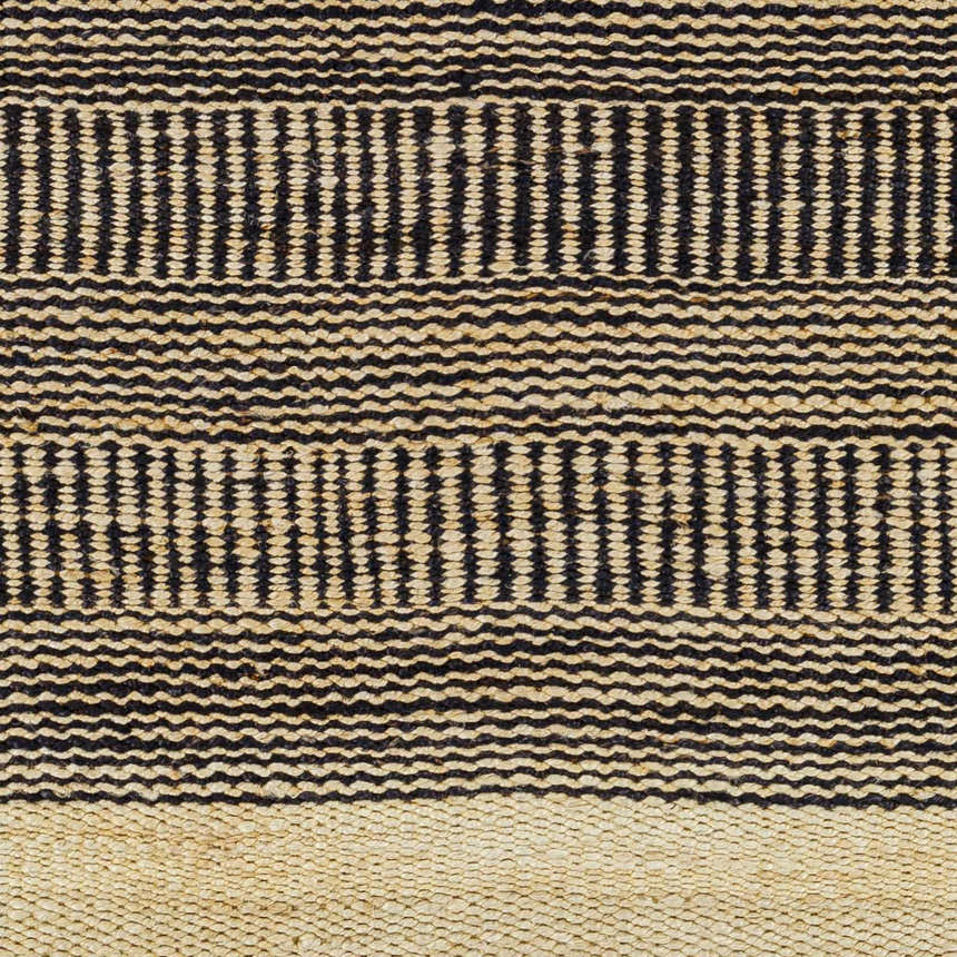 Close-up of the Black Elle Area Rug, a hand-woven jute rug with a geometric pattern in black and beige. Swatch