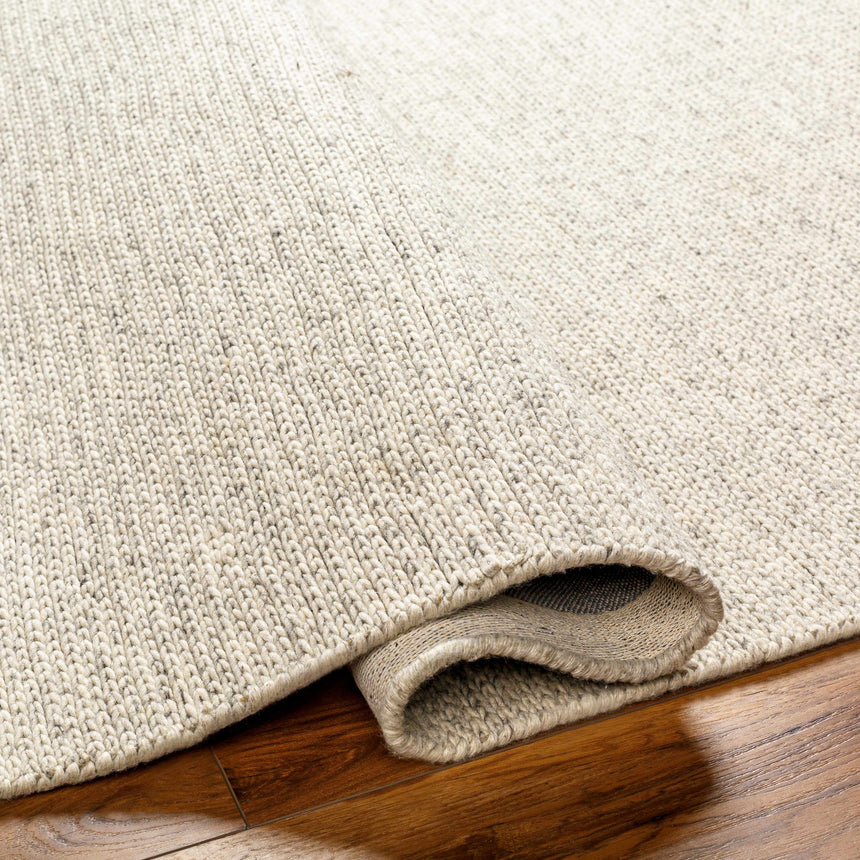Alyra Beige Solid Area Rug - Clearance