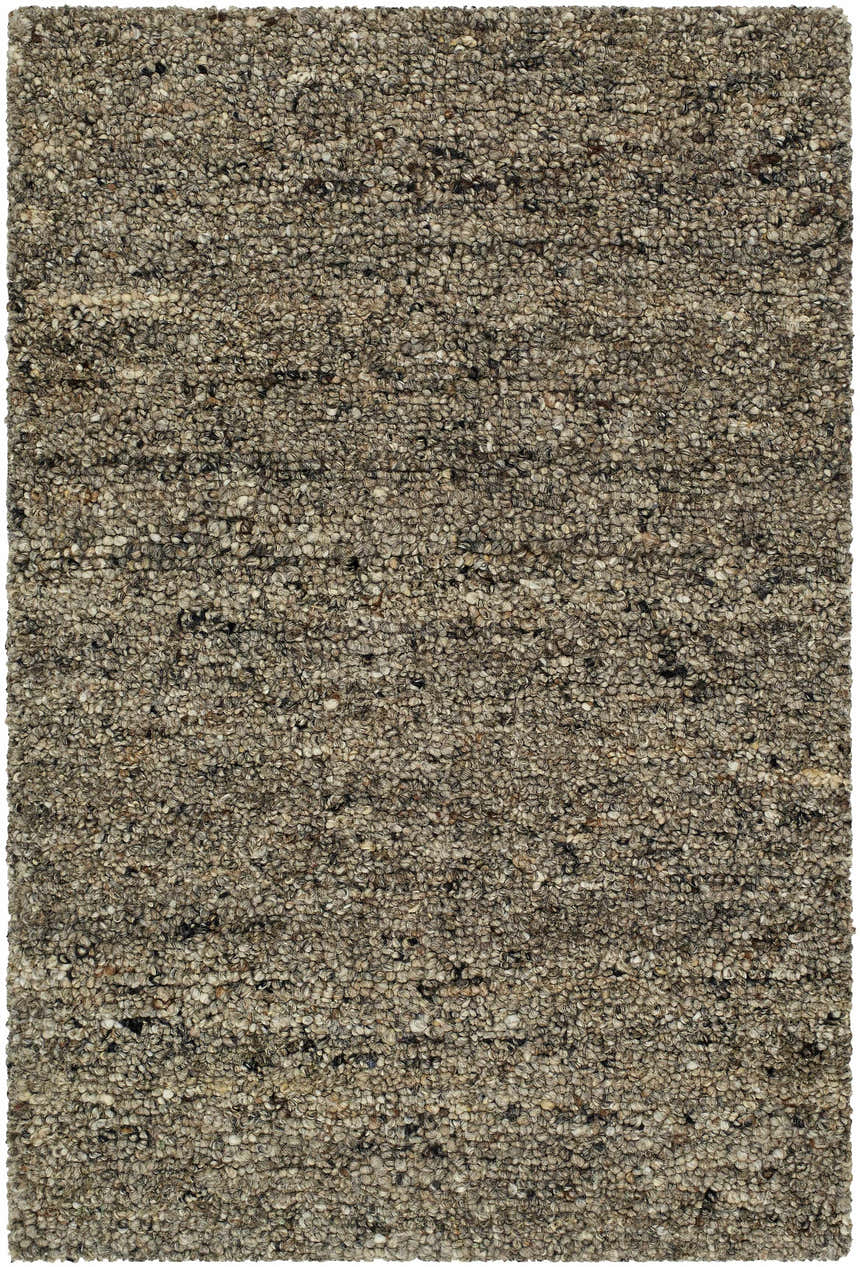 Close-up of the hand-tufted Sevan Taupe Wool Area Rug, showing its textured wool pile and subtle dark purple, gray, and sage tones. Design-Rectangle-23