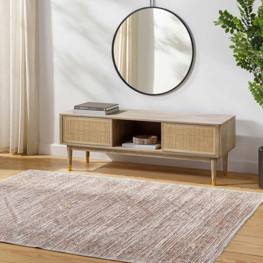 Living room scene with a taupe Elisa Area Rug, wood floors, and a light wood media console. Roomscene-Rectangle