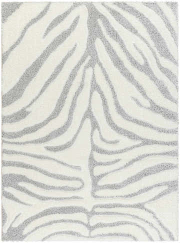 Close-up of the Dysis Gray Zebra Print Area Rug, a shag rug with a gray and white zebra stripe pattern. Design-Rectangle-537