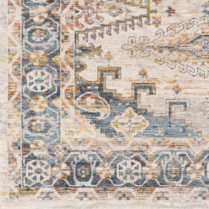 Close-up of the Espy Area Rug: traditional oriental pattern in brick red, burnt orange, cream, and dark blue hues. Swatch